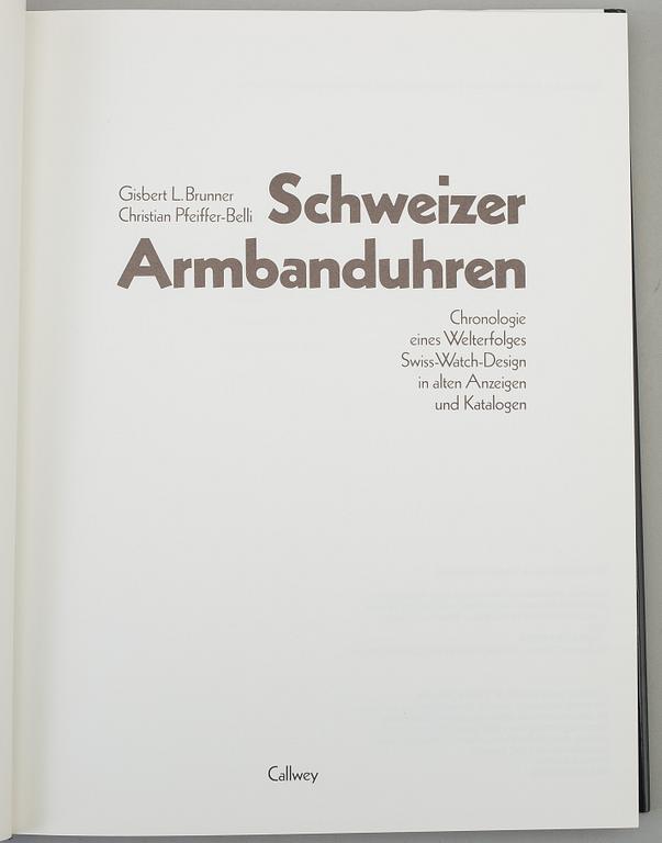 A set of 5 watch books.