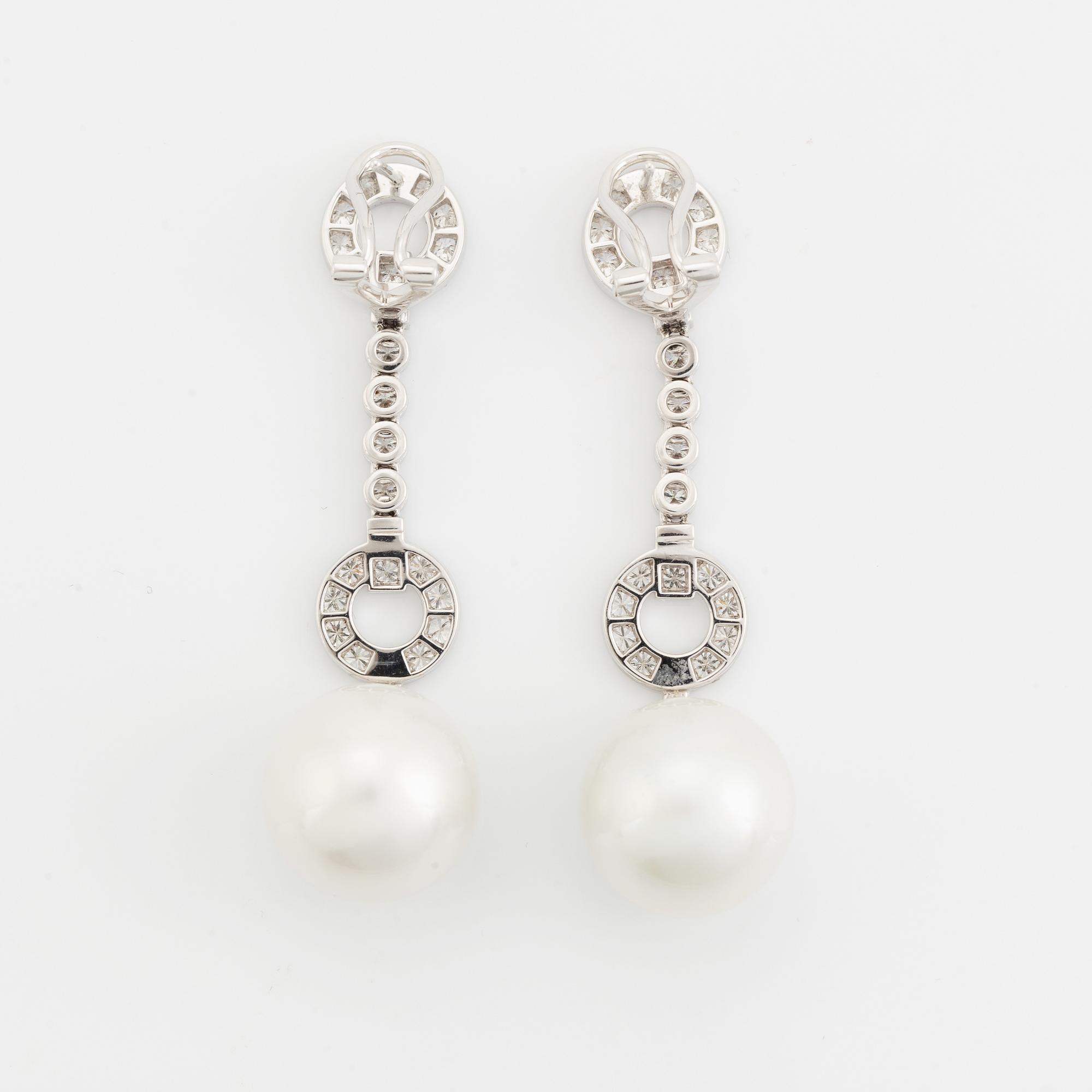 South sea pearl and brilliant cut diamond earrings.