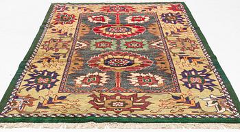 A west Persian carpet of 'Arts and Crafts design', c. 291 x 184 cm.