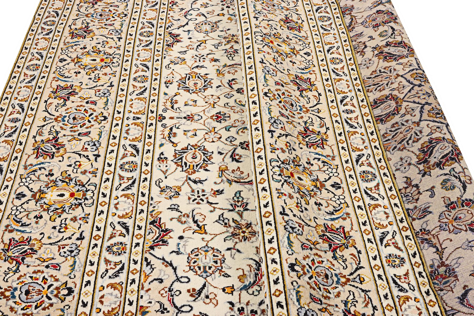 A Kashan carpet, c. 345 x 242 cm.