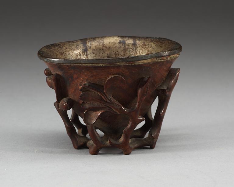 A carved bambu libation cup, Qing dynasty.