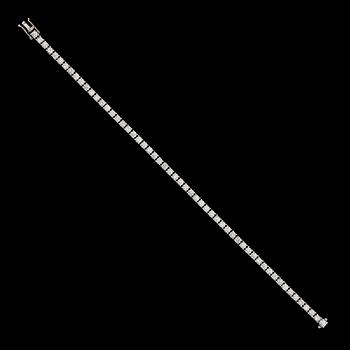 ARMBAND, 18K vitguld, Rivièrelänk, briljantslipade diamanter tot ca 4.83 ct. Vikt ca 12 g.