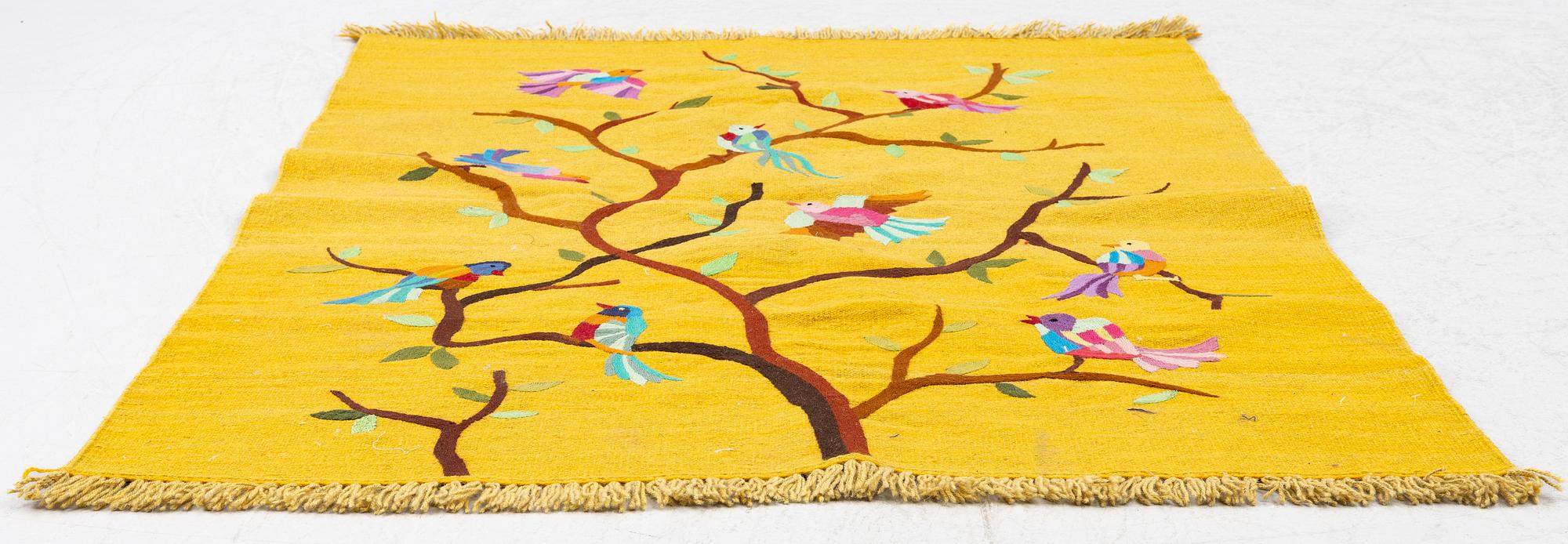 A hand-embroidered Kelim rug, c. 178 x 122 cm.