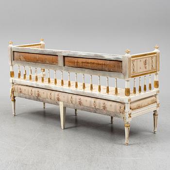 A late gustavian sofa, ca 1800.