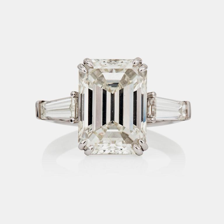 A 7.09 ct I/VS emerald-cut diamond ring. Certificates from HRD and GIA.