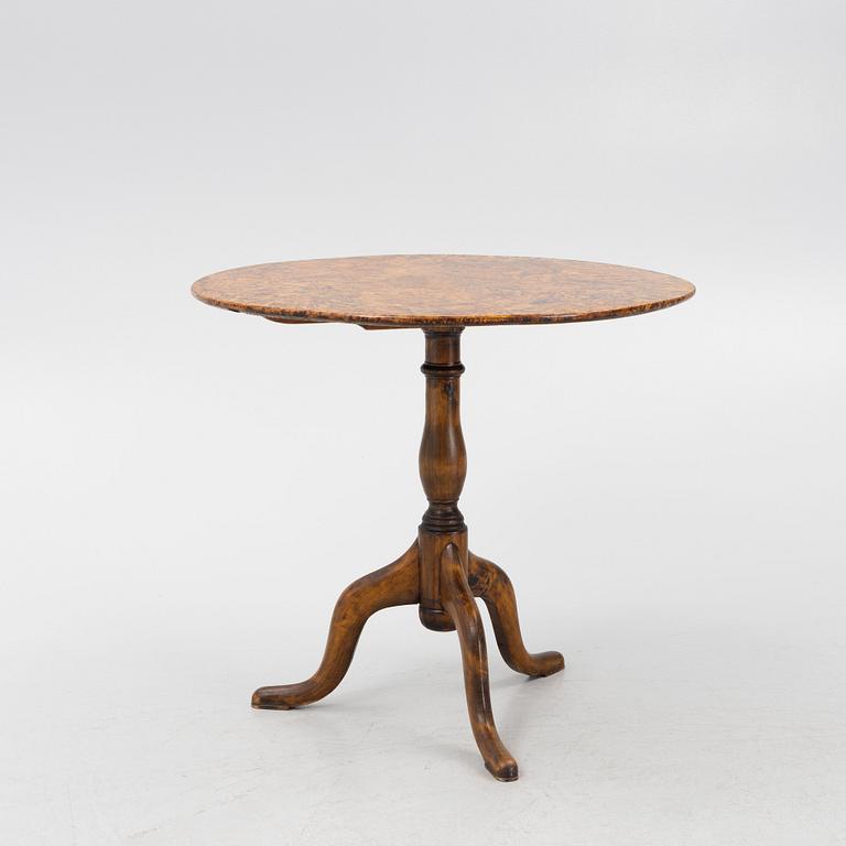 A burr alder tilt-top table by J. Sjölin (master 1767-85).