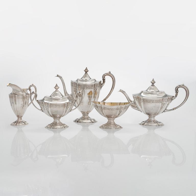 A five-piece sterling silver coffee and tea service, and 12 spoons, USA, first quarter of the 20th century.