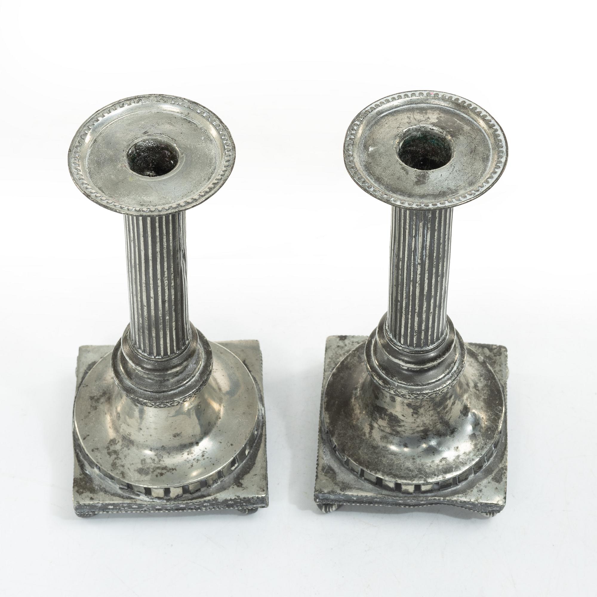 A pair of peuter candlesticks by Hans Wicksten (active between 1782-1810), Västerås.