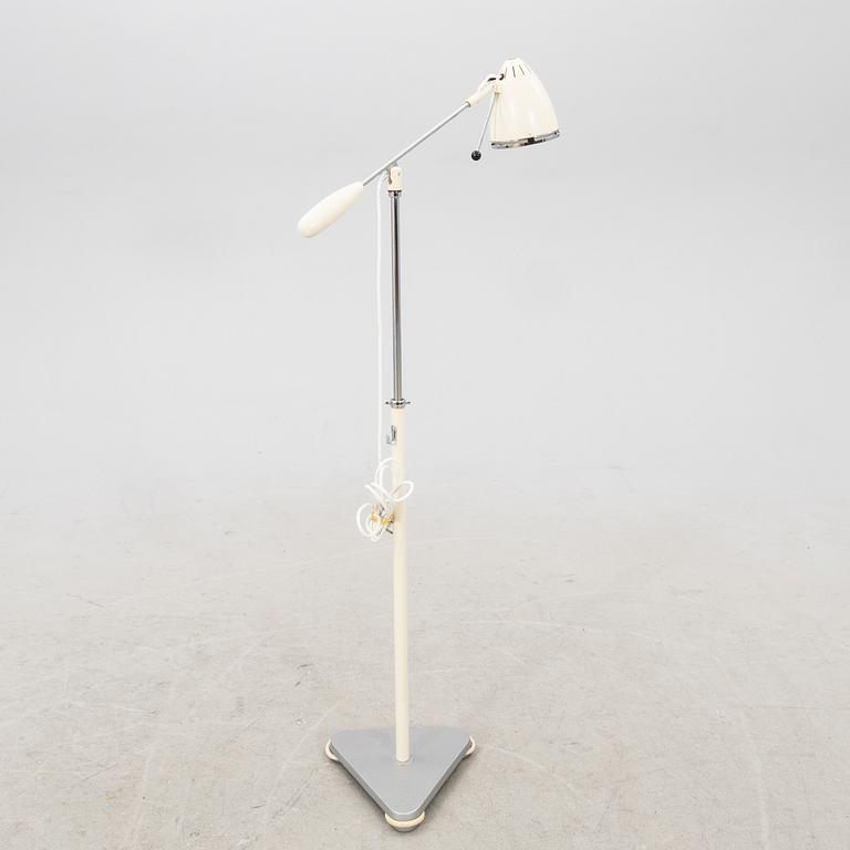 A mid 1900s industrial floor lamp.