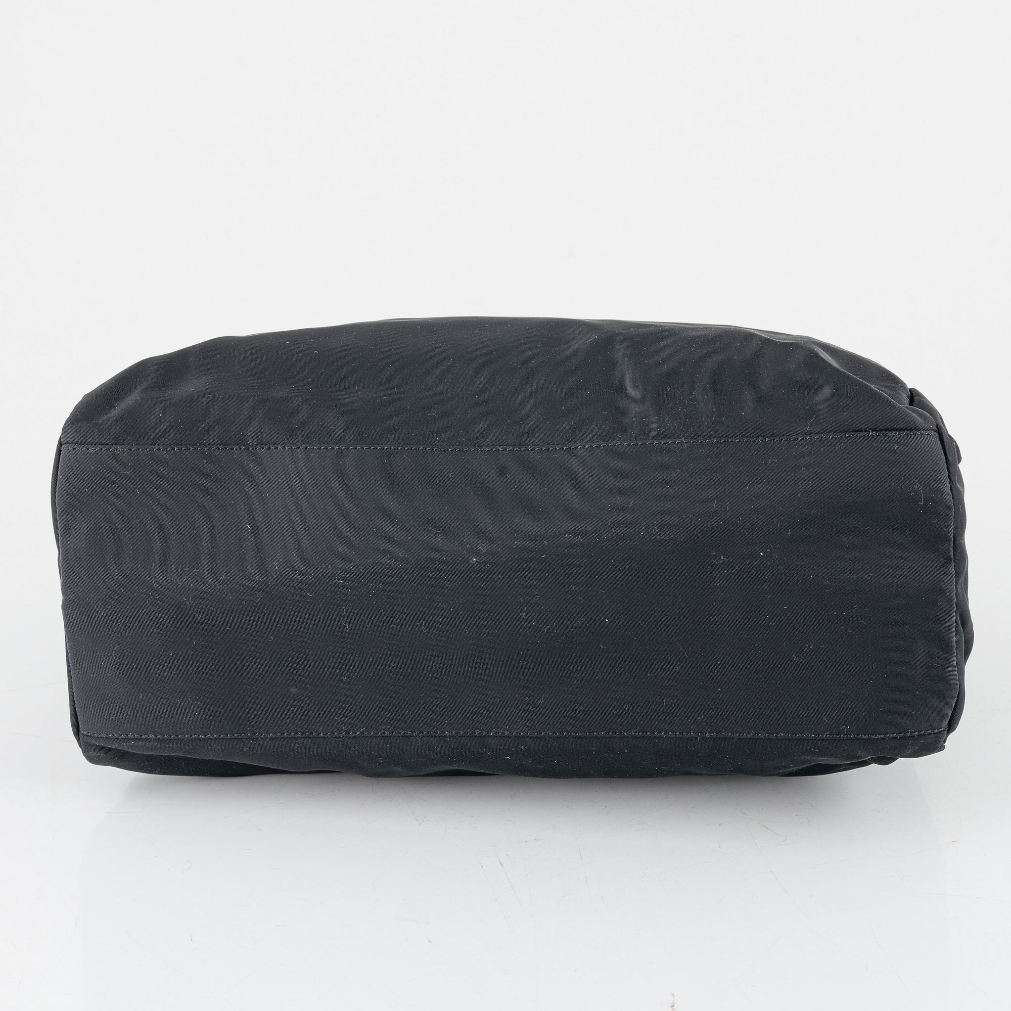 Prada, a black nylon handbag.