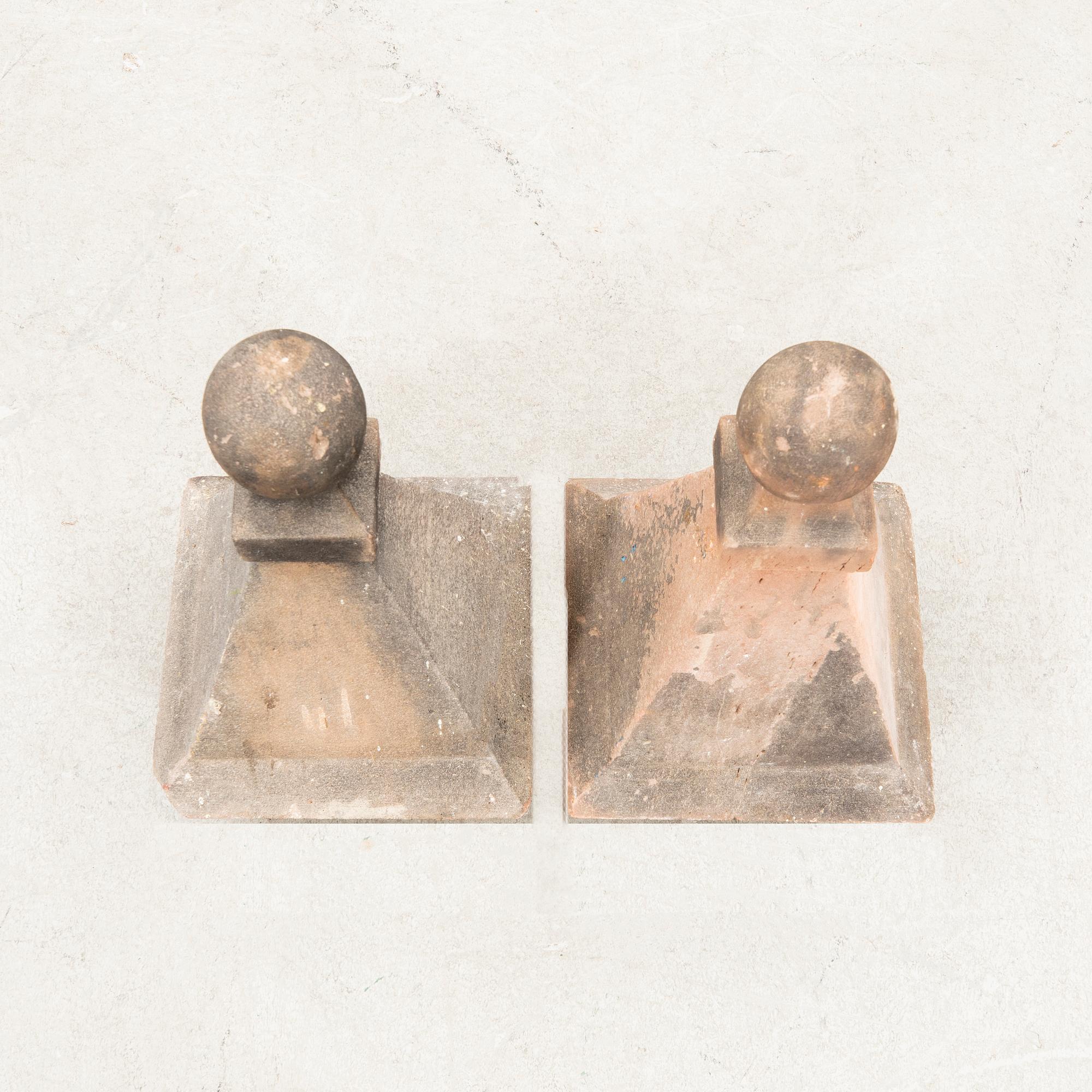 A pair 19/20.th century sandstone gate post tops.