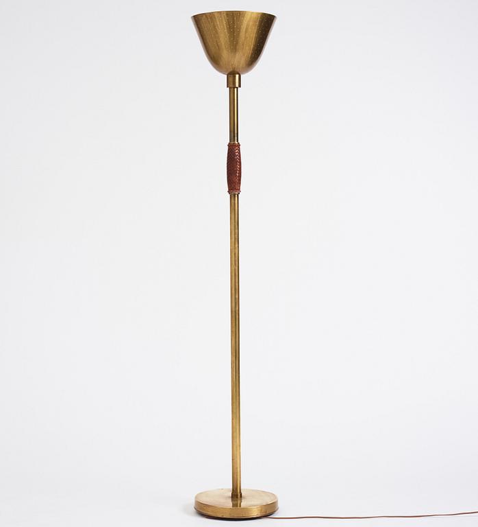 Carl-Axel Acking, a brass and leather floor lamp, designed for the Stockholm Association of Crafts in 1939.