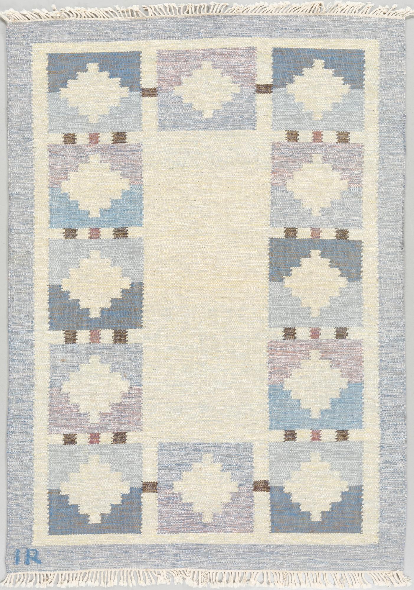 A flat weave carpet designed by Ida Rydelius from the second half of the 20th century.