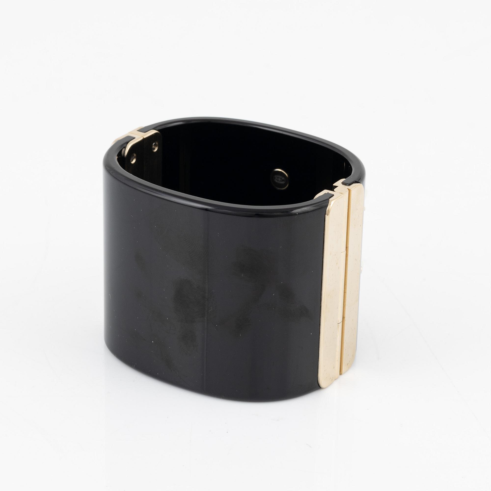 Chanel, a black acrylic bracelet with pearls, 2022.