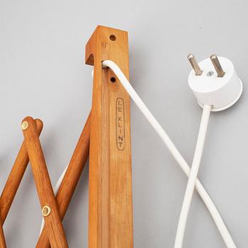 Two Le klint wooden wall lamps.