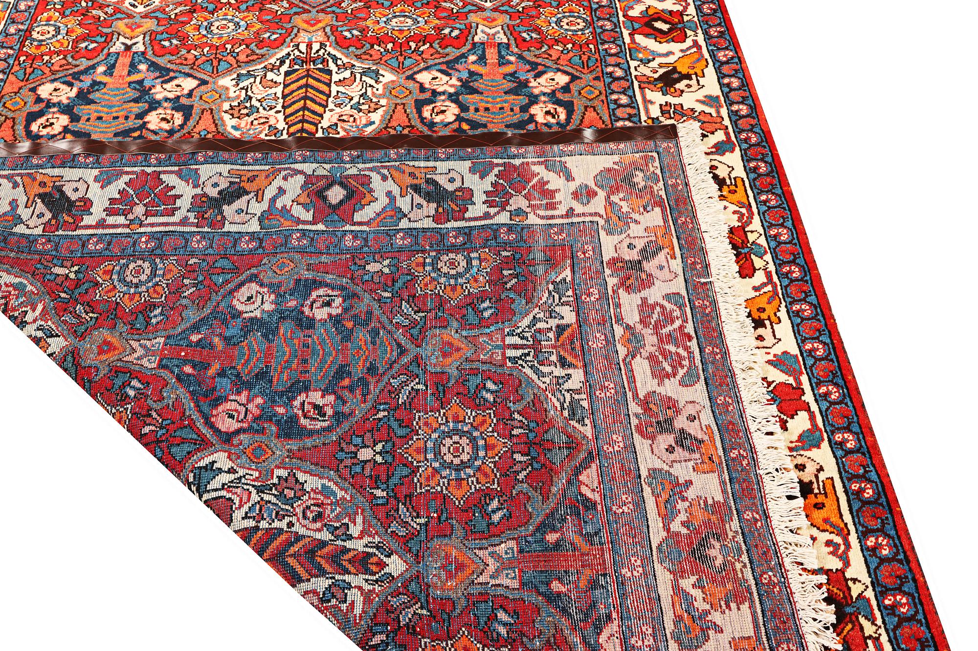 A Hamadan carpet, c. 335 x 184 cm.
