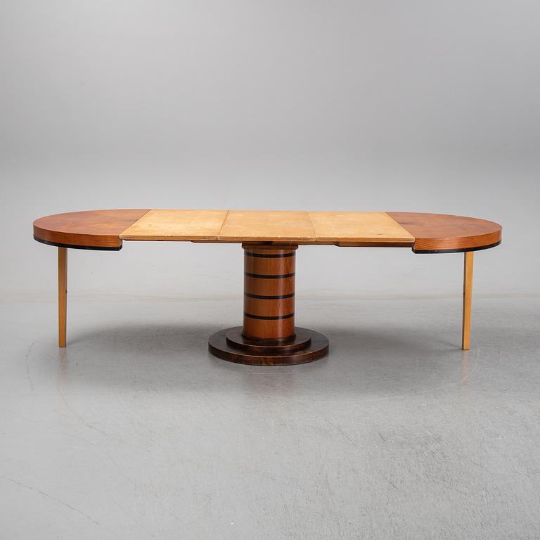 An elm veneered dining table, 1930's/40's.