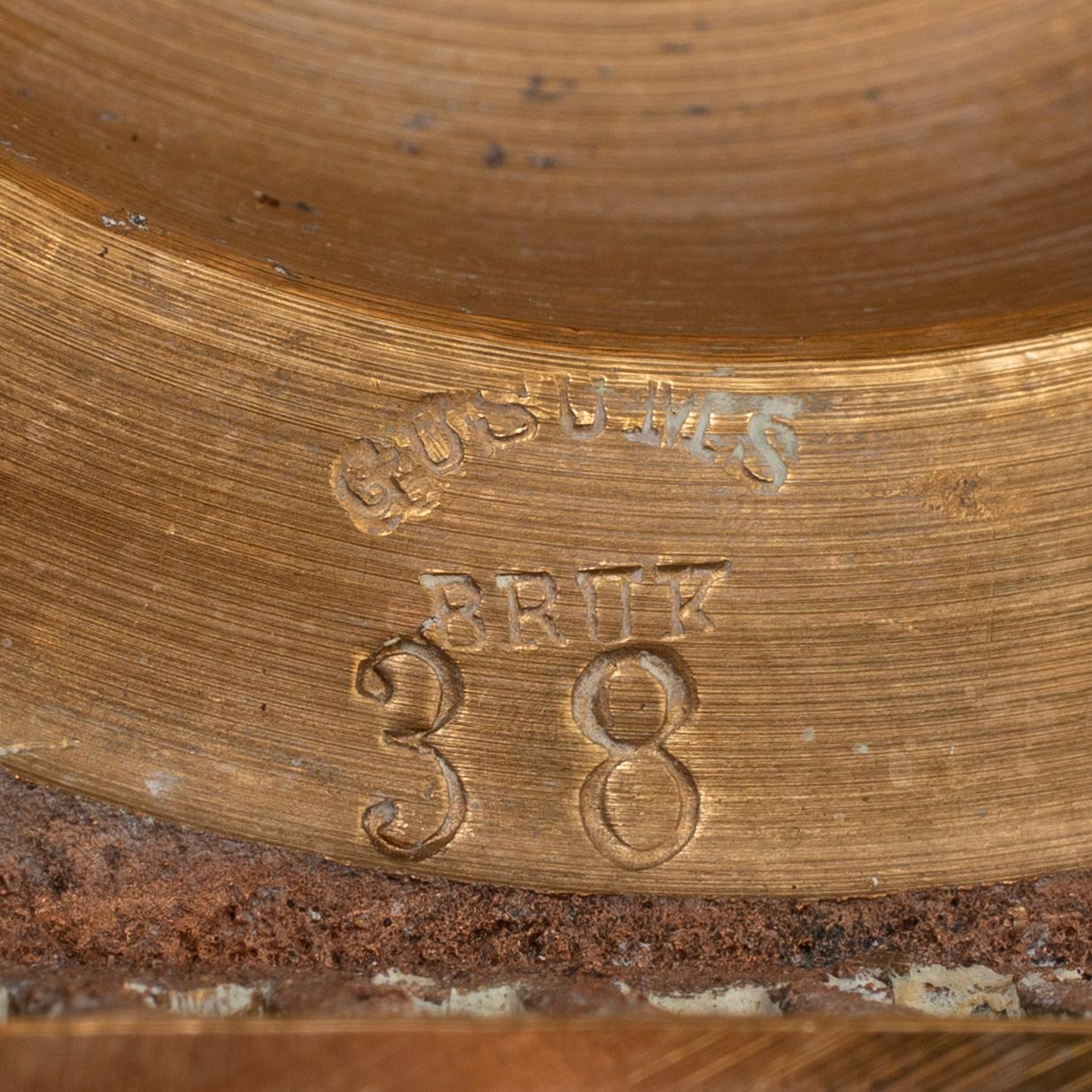 A pair of model 38 brass candlesticks from Gusums Bruk, first half of the 20th century.