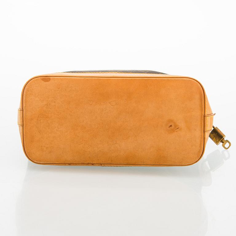 Louis Vuitton, a 'Lockit PM' bag.