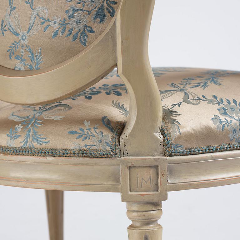 A pair of carved Gustavian chairs by J. Mansnerus (master 1756-1779).