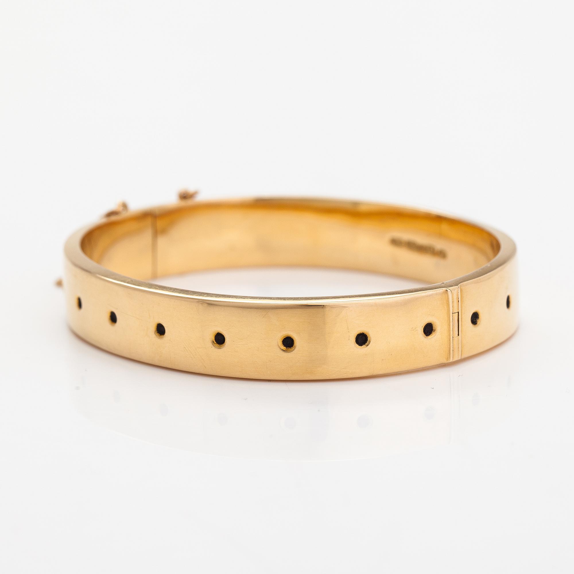Kirsti Ilvessalo, An 18K gold and enamel bracelet. Westerback/Kalevala Koru, Helsinki 1959.