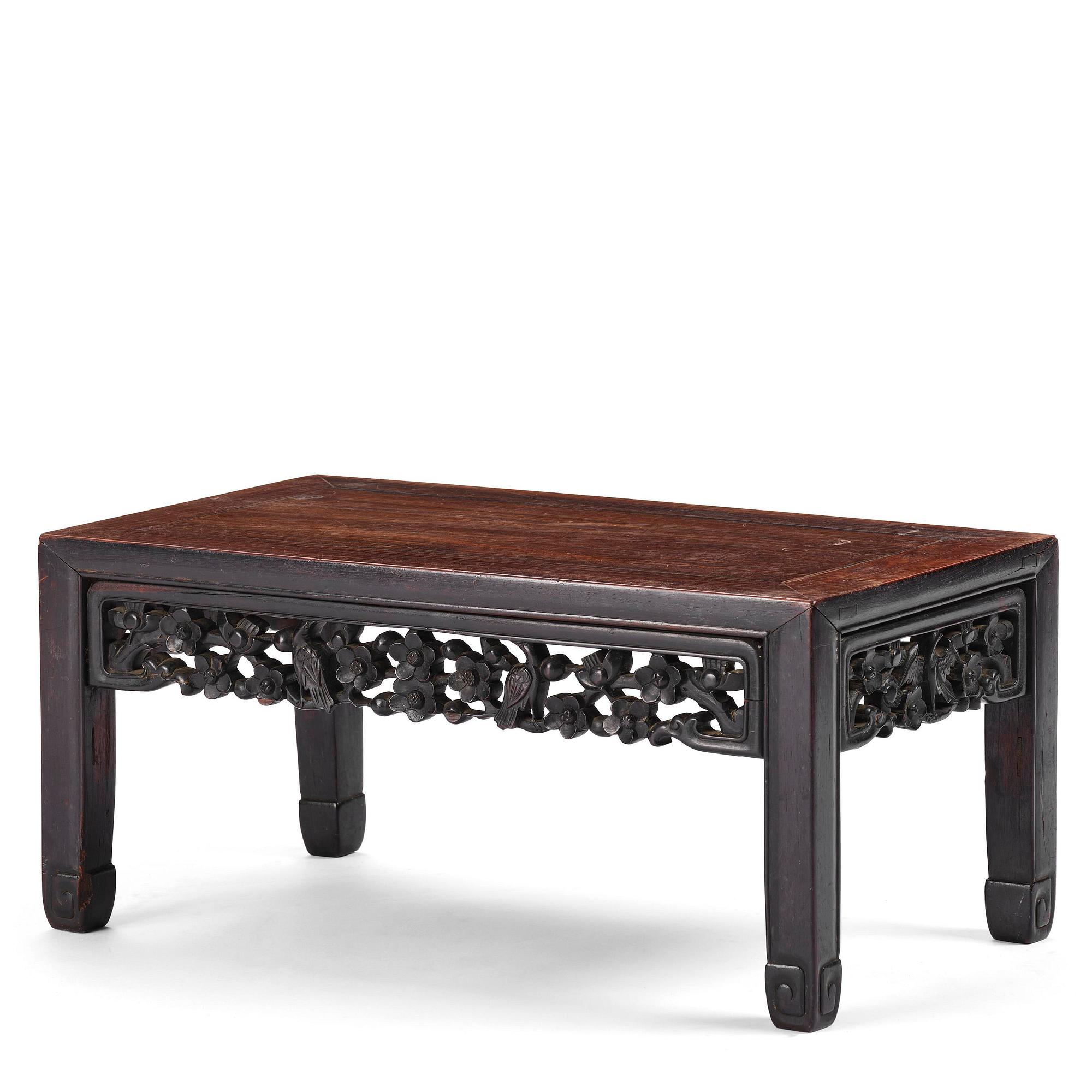 A Chinese hardwood kang table, late Qing dynasty.