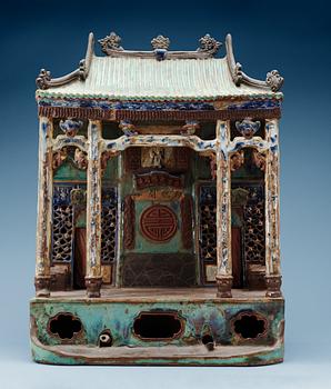 1668. A large glazed shrine, presumably Ming dynasty.