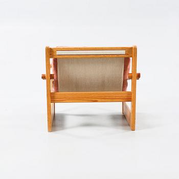 An easy chair with footrest, model "Remo", designed by Yngve Ekström for Swedese Möbler AB 1970.