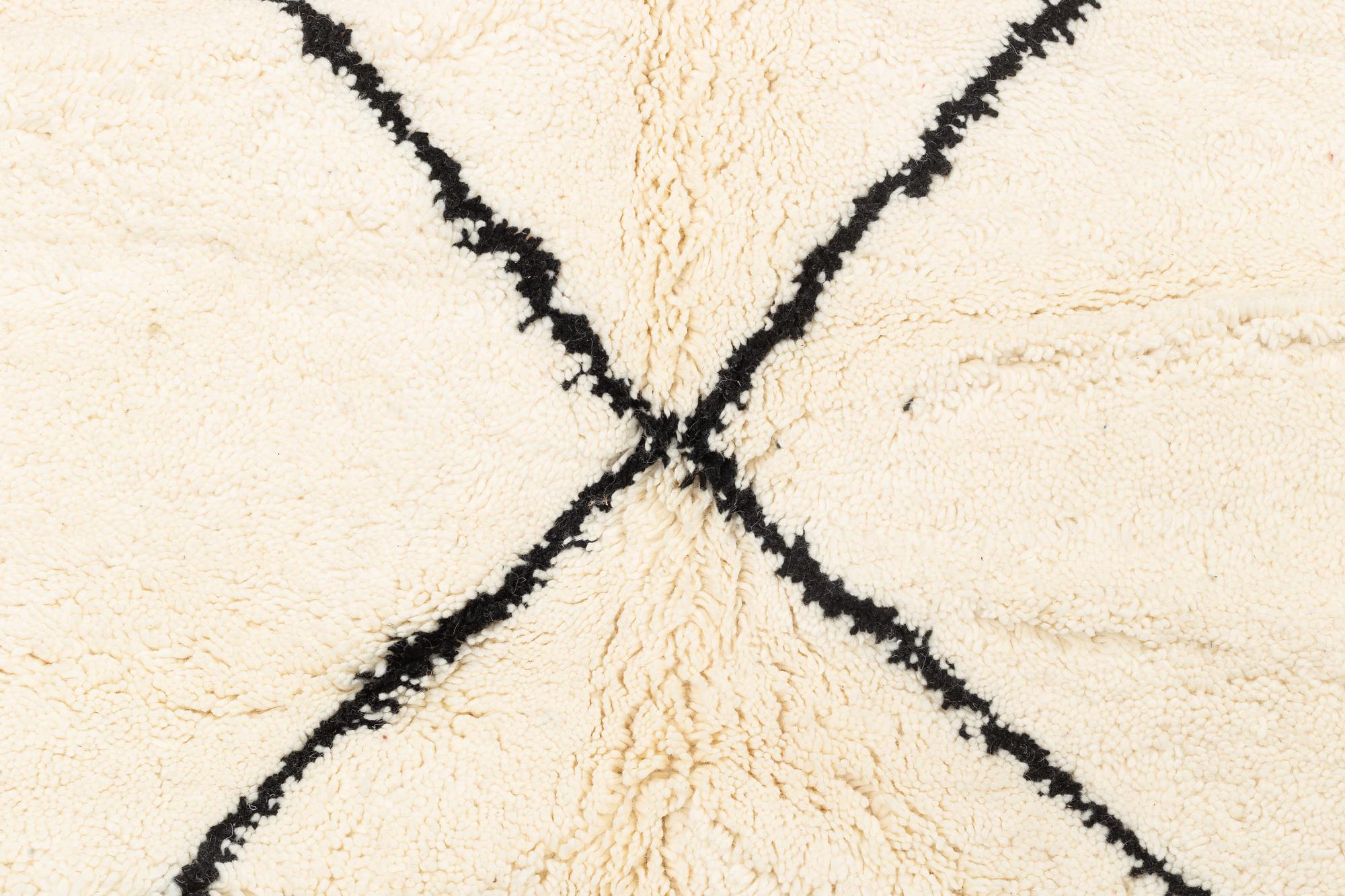 A Carpet, Morocco, circa 390 x 340 cm.