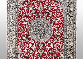 A rug, Nain, part silk, 9 LAA, ca 240 x 150 cm.
