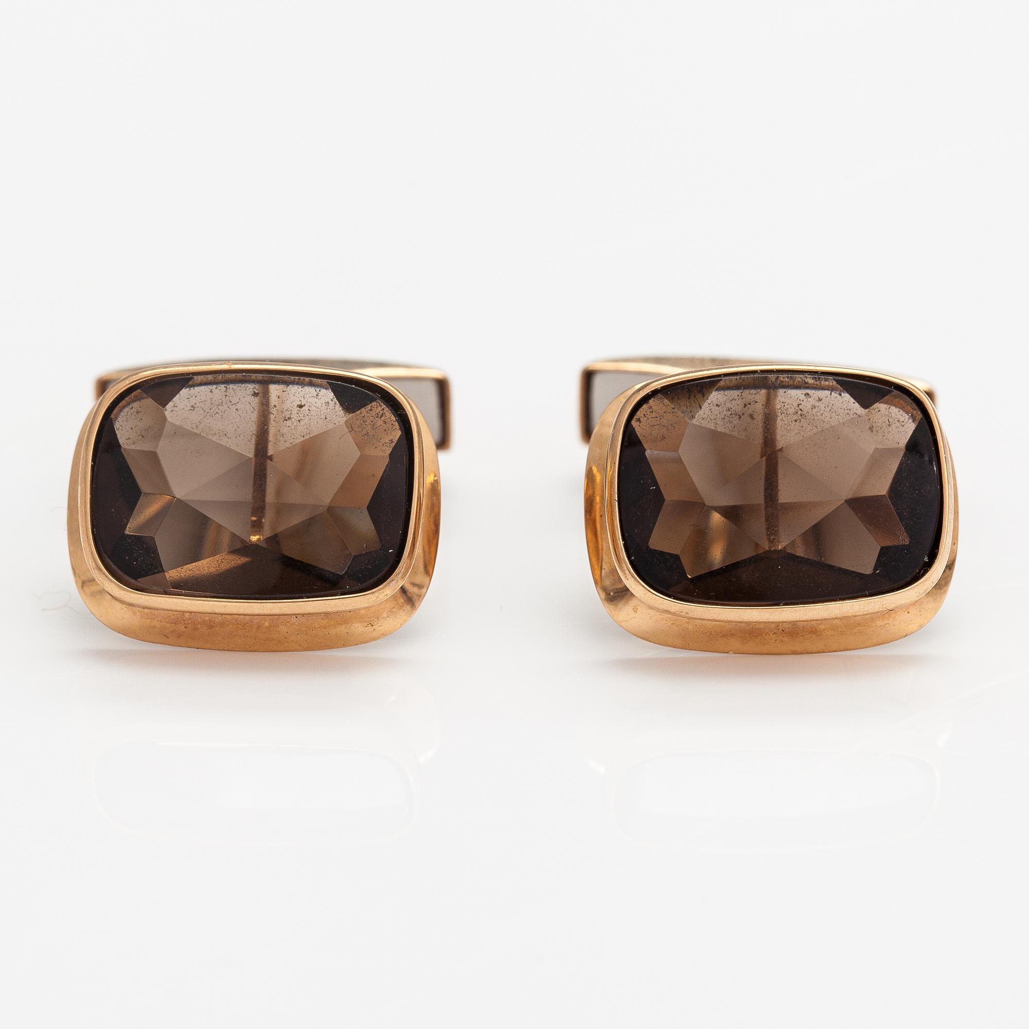 A pair of 14K gold cufflinks with smoaky quartzes. Liitola & Koistinen kultasepät, Turku 1977.