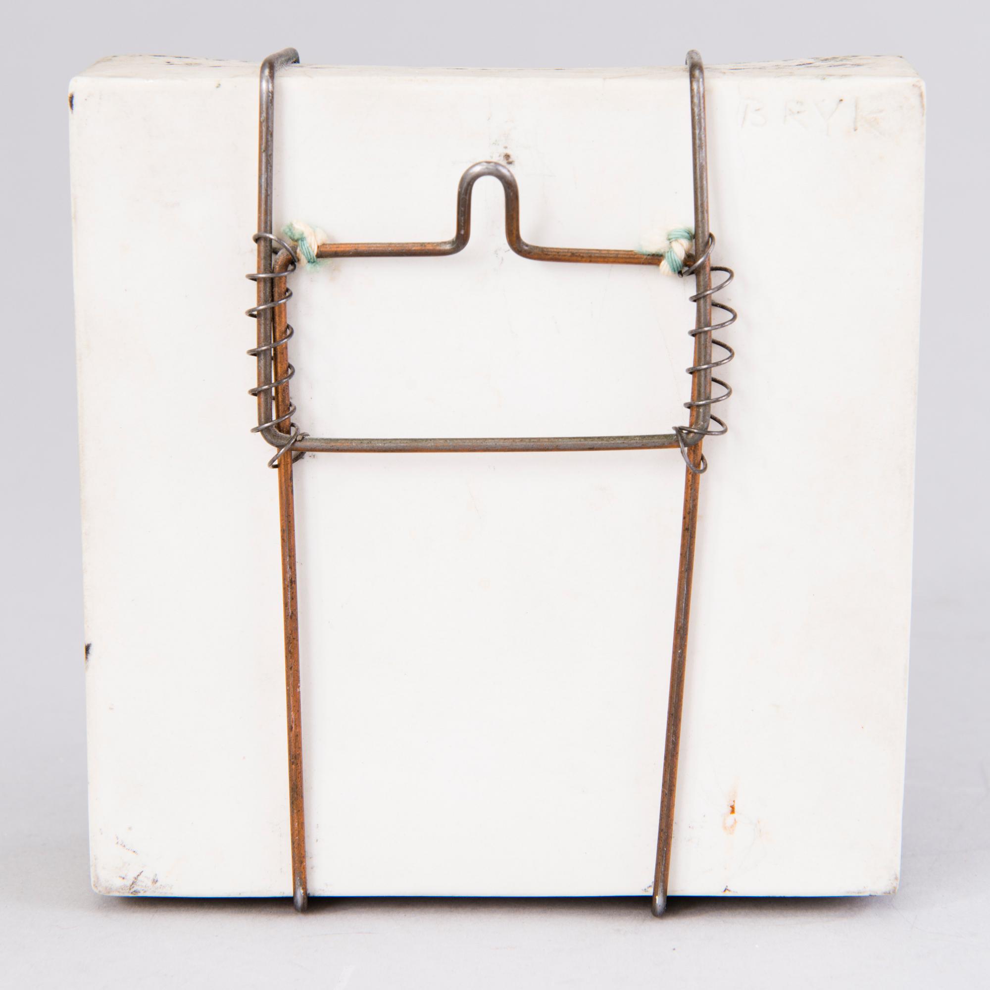 RUT BRYK, A stoneware relief signed a tergo Bryk.