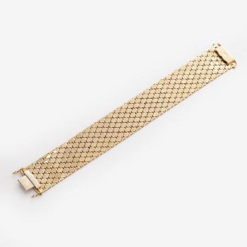 Armband i 14K trefärgsguld.