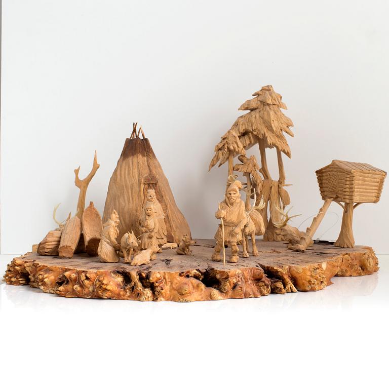 MARTIN STENSTRÖM, Jutsajaure, skulpturgrupp, snidat trä, signerad M.S. och daterad Jutsajaure 1987.