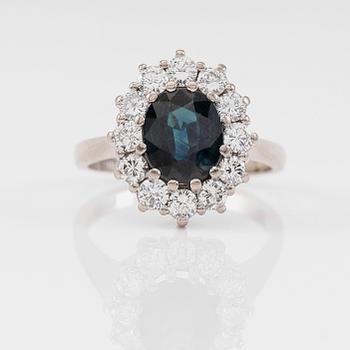 RING, 18K vitguld, blå safir, briljantslipade diamanter tot ca 1.00 ct, svenska stämplar SGG, Stockholm 1991.