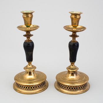 A pair of Skultuna brass candlesticks, early 20th Cenury.