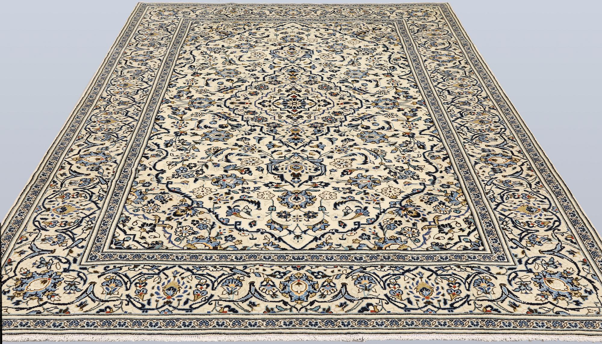 A Keshan carpet, approx. 302 x 203 cm.
