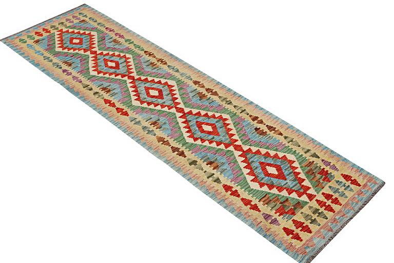 A runner carpet, Kilim, c. 287 x 80 cm.