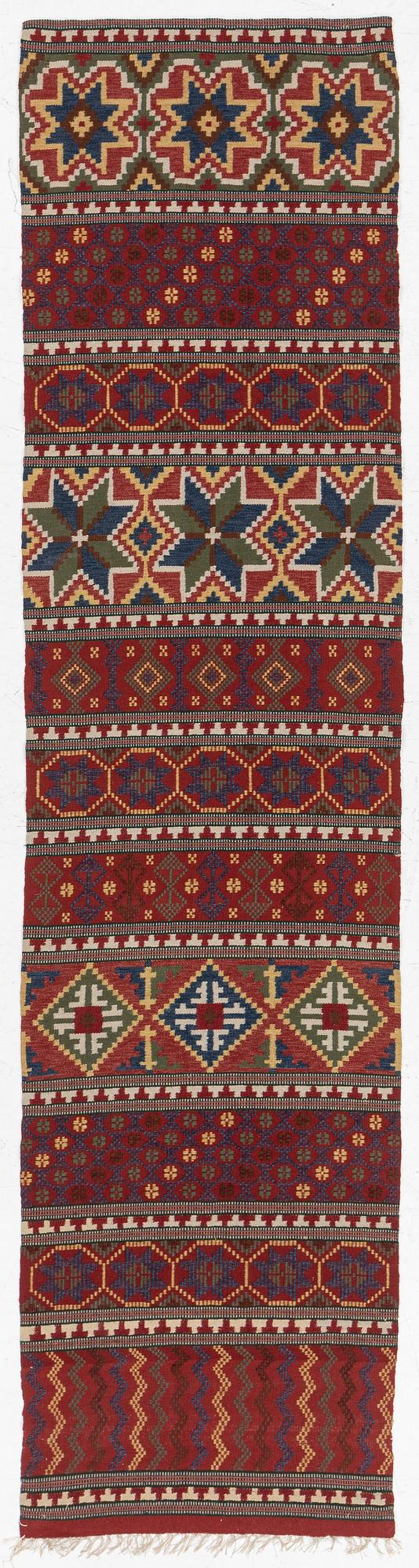 A bench cushion, flat weave, c. 262 x 64 cm, Scania, around the year 1900.