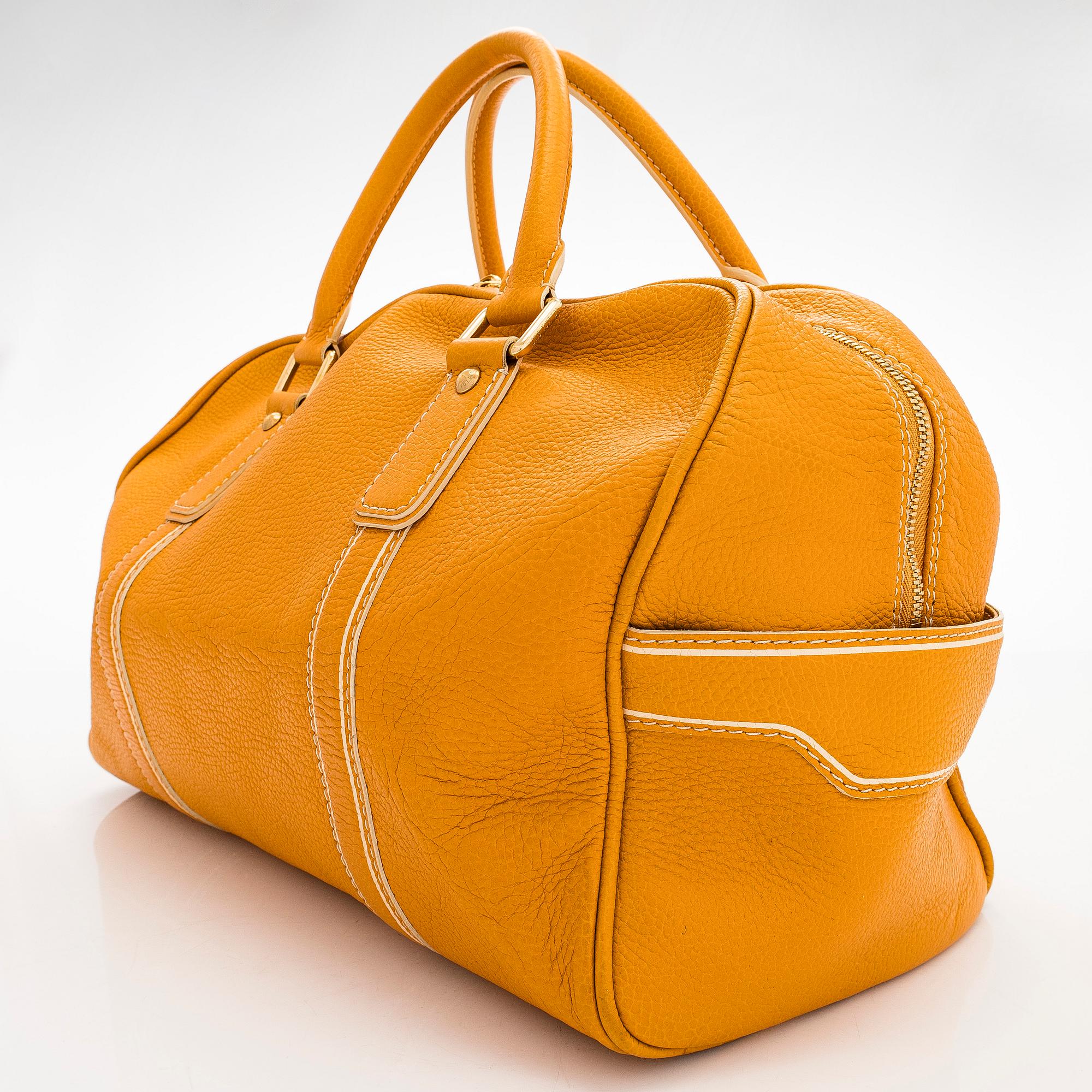 Louis Vuitton, a 'Tobago Carryall' bag.