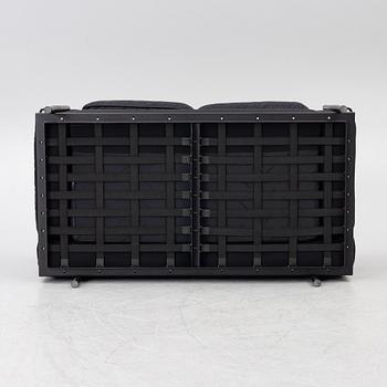 Pierre Jeanneret, Charlotte Perriand & Le Corbusier, an 'LC 2' sofa, Cassina, Italy.