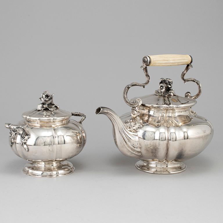 A silver teapot and sugar bowl, maker's mark of Carl Bojanowski, St. Petersburg 1851-57.