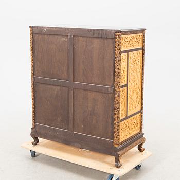 A Chinese wooden cabinet  mid 1900s.