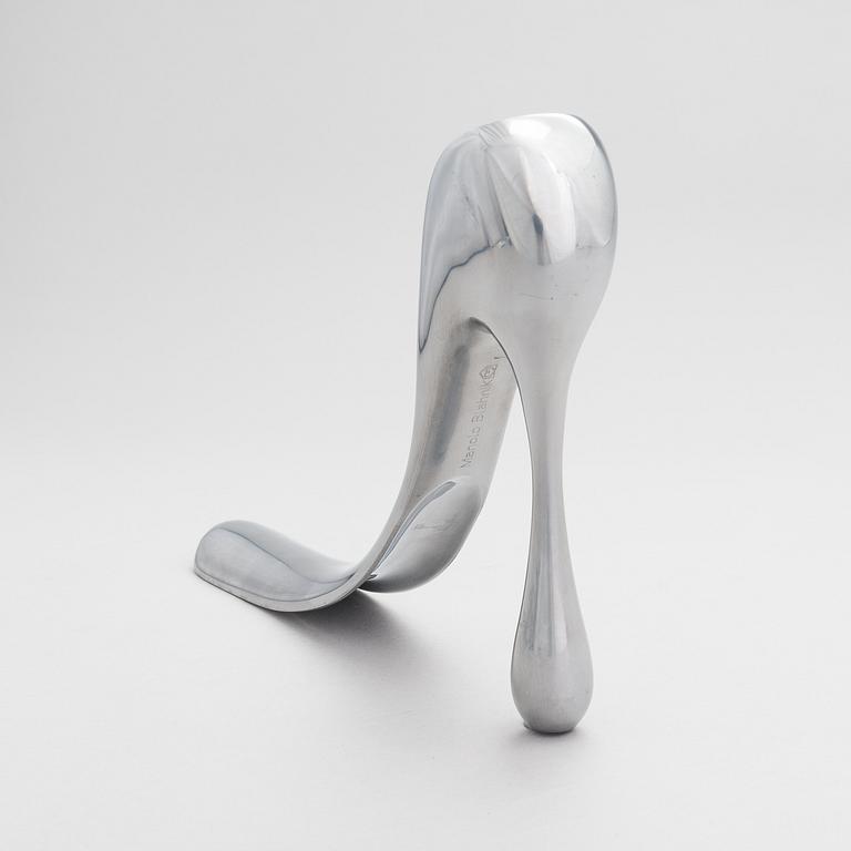 A metal shoe horn by Manolo Blahnik, 2000s.