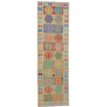 A runner, kilim, ca 301 x 91 cm.