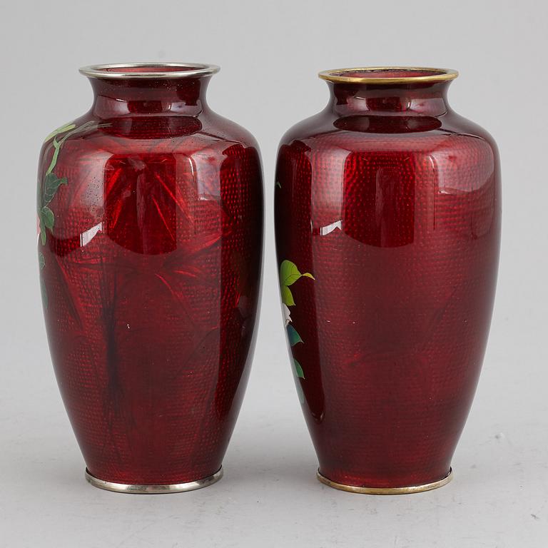 A pair of Japanese enamelled vases, Meiji (1868-1912).