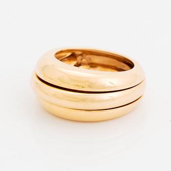 An 18K gold Cartier ring.