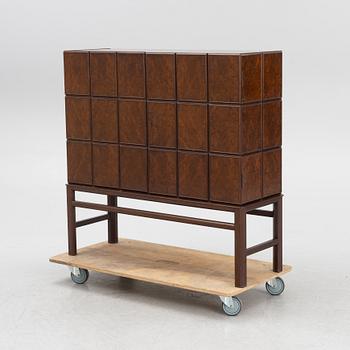 A Swedish Modern cabinet, 1930s-40s.