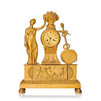 115. A French Empire gilt bronze mantel clock, 19th century.