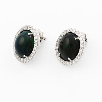 Earrings 18K white gold with opals and octagon-cut diamonds.